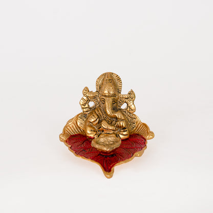 Ganesh Idol on Leaf - Lord Ganesha with Diya