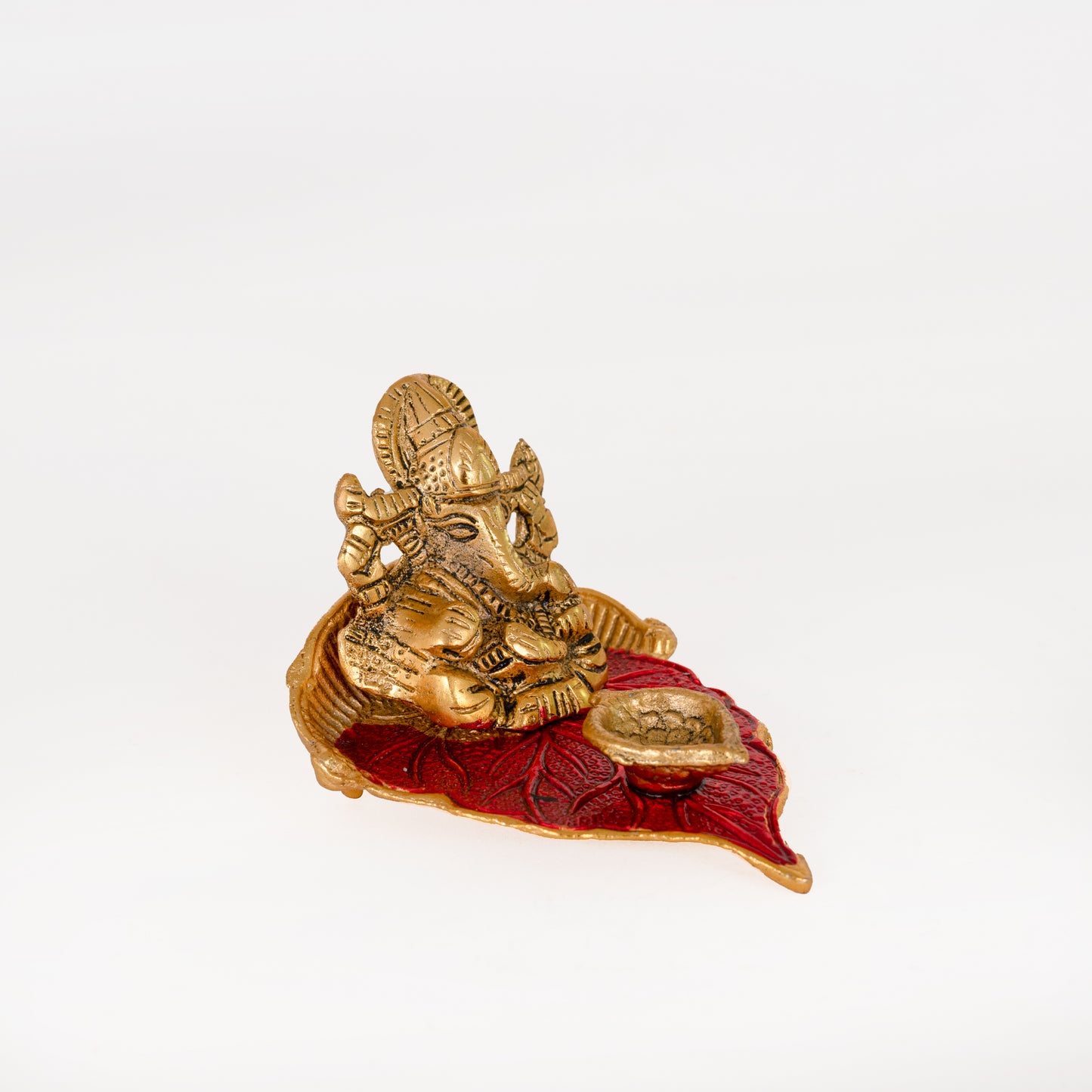 Ganesh Idol on Leaf - Lord Ganesha with Diya