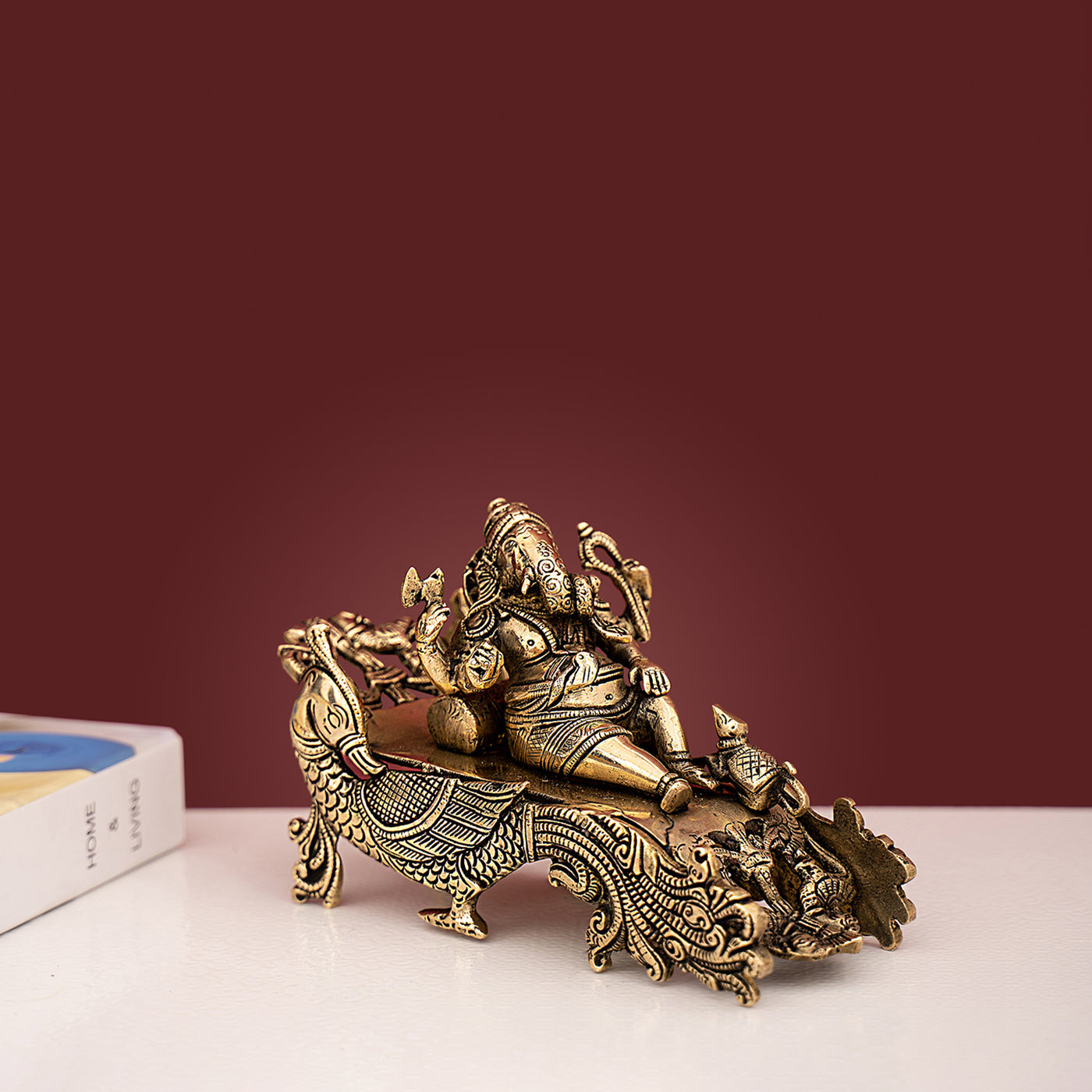 Brass Sofa Ganesha- Lord Ganesha Resting On Peacock Couch